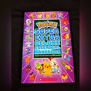 Scholastic Pokémon Handbook with Purple Cover